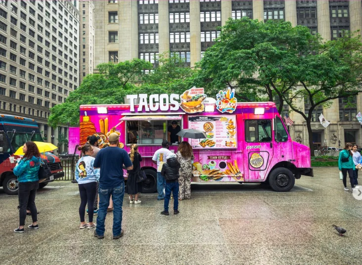 Finished custom food truck built by JC Installation serving customers in downtown Chicago.